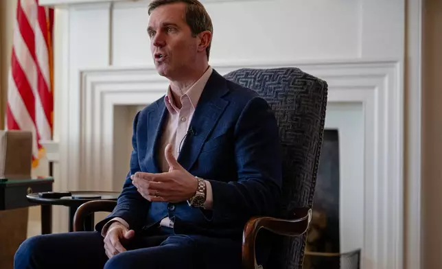 Kentucky Gov. Andy Beshear gives an interview, Monday, Jan. 12, 2026, in Frankfort, Ky. (AP Photo/Jon Cherry)