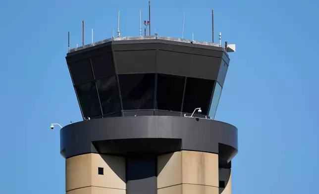 FILE - The control tower at Nashville International Airport stands Oct. 31, 2025, in Nashville, Tenn. (AP Photo/George Walker IV, File)