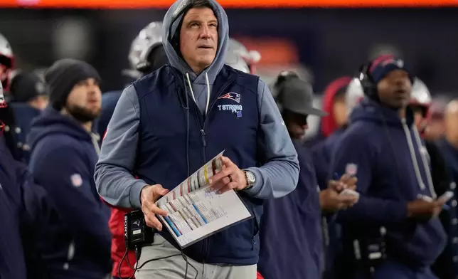 New England Patriots head coach Mike Vrabel on the sidelines in the first half of an NFL wild-card playoff football game against the Los Angeles Chargers, in Foxborough, Mass., Sunday, Jan. 11, 2026. (AP Photo/Charles Krupa)