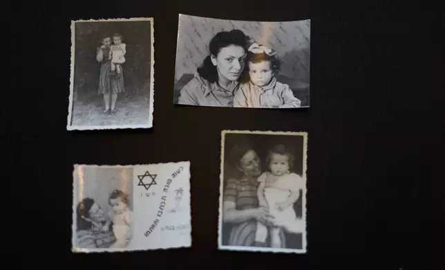 Photos of Holocaust survivor Ilana Shalem-Kantorowics born in the Nazi Bergen-Belsen concentration camp with her with mother Lola in the camp in 1946, in Tel Aviv, Israel, Jan. 26, 2026. (AP Photo/Ariel Schalit)
