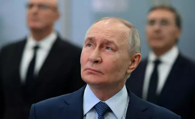 Russian President Vladimir Putin visits the Moscow Institute of Physics and Technology (MIPT) in Dolgoprudny, Moscow Region, Russia, Friday, Jan. 23, 2026. (Grigory Sysoyev, Sputnik, Kremlin Pool Photo via AP)