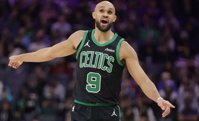Boston Celtics guard Derrick White reacts after not getting a foul call against the Sacramento Kings during the first half of an NBA basketball game Thursday, Jan. 1, 2026, in Sacramento, Calif. (AP Photo/Scott Marshall)