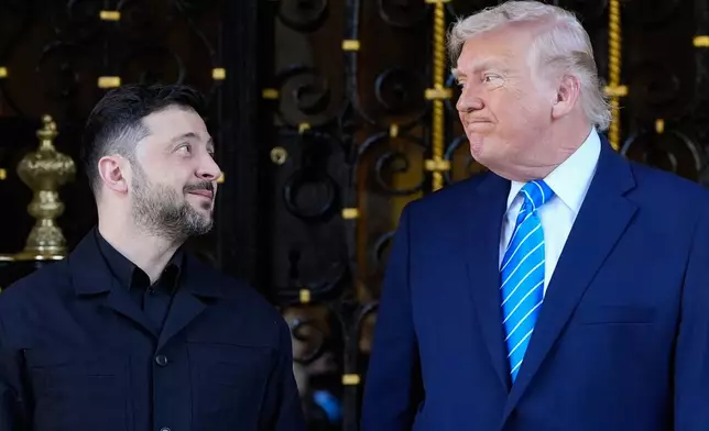 FILE - U.S. President Donald Trump greets Ukraine's President Volodymyr Zelenskyy at his Mar-a-Lago club, Dec. 28, 2025, in Palm Beach, Florida. (AP Photo/Alex Brandon, File)