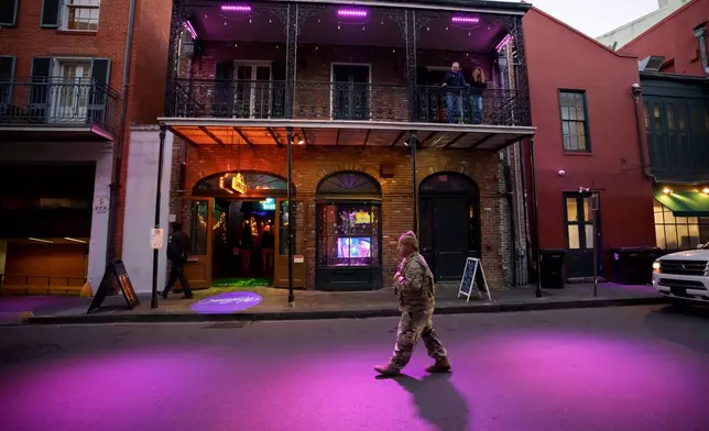 FILE - The Louisiana National Guard, military police, and Louisiana law enforcement patrol the French Quarter as part of a National Guard deployment for New Year's celebrations in New Orleans, Dec. 30, 2025. (AP Photo/Matthew Hinton, File)