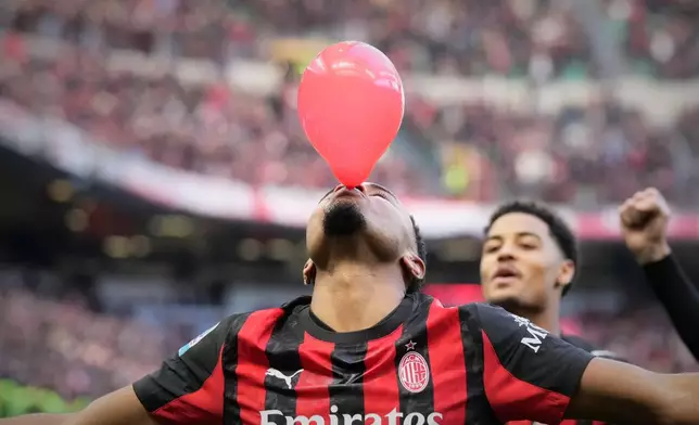 FILE - AC Milan's Christopher Nkunku celebrates after scoring his side's second goal from a penalty kick during a Serie A soccer match between AC Milan and Hellas Verona, in Milan, Italy, Dec. 28, 2025. (AP Photo/Luca Bruno, File)
