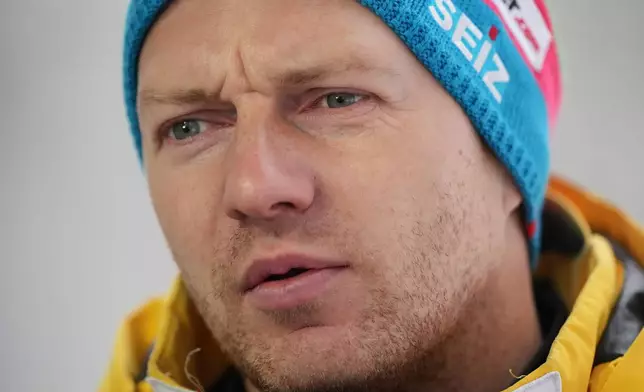 FILE - Germany's Francesco Friedrich talks during an interview with the Associated Press ahead of a three-day skeleton and bobsled World Cup stage and Olympic test event in Cortina D'Ampezzo, Italy, Thursday, Nov. 20, 2025. (AP Photo/Andrew Medichini, FILE)