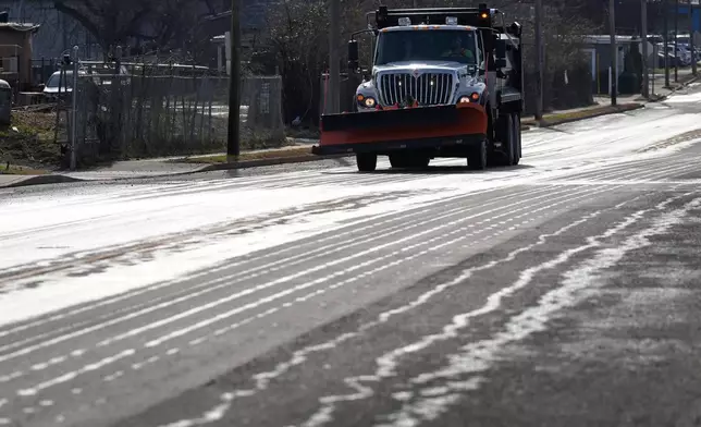 A Nashville Department of Transportation truck applies salt brine to a roadway Thursday, Jan. 22, 2026, in Nashville, Tenn. ahead of a winter storm expected to hit the state over the weekend. (AP Photo/George Walker IV)