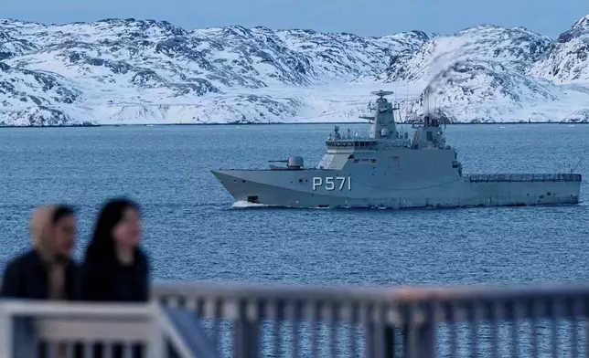FILE - Military vessel HDMS Ejnar Mikkelsen of the Royal Danish Navy patrols near Nuuk, Greenland, Jan. 15, 2026. (AP Photo/Evgeniy Maloletka, File)