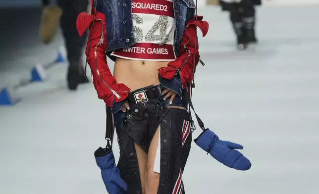 FILE - A model wears a creation as part of the Dsquared2 Fall/Winter 2026-2027 Men's collection presented in Milan, Italy, Jan. 16, 2026. (AP Photo/Antonio Calanni)