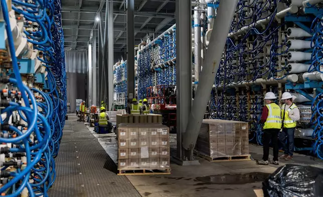 Reverse osmosis machinery operates at the Carlsbad desalination plant in Carlsbad, Calif., Tuesday, Dec. 2, 2025. (AP Photo/Annika Hammerschlag)