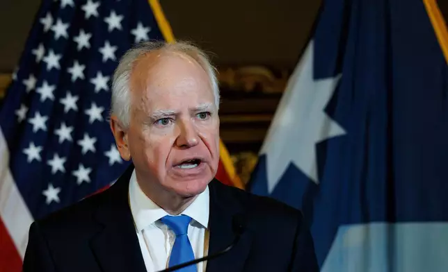 Minnesota Gov. Tim Walz holds a news conference at the Minnesota State Capitol on Monday, Jan. 5, 2026, in St. Paul, Minn. (Kerem Yücel/Minnesota Public Radio via AP)