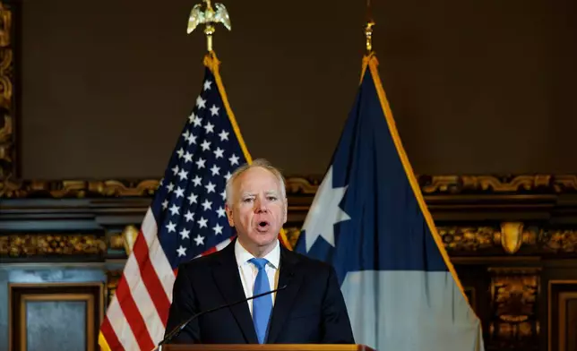 Minnesota Gov. Tim Walz holds a news conference at the Minnesota State Capitol on Monday, Jan. 5, 2026, in St. Paul, Minn. (Kerem Yücel/Minnesota Public Radio via AP)