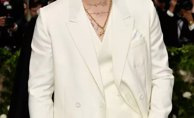 FILE - Brooklyn Beckham appears at The Metropolitan Museum of Art's Costume Institute benefit gala in New York on May 6, 2024. (Photo by Evan Agostini/Invision/AP, File)