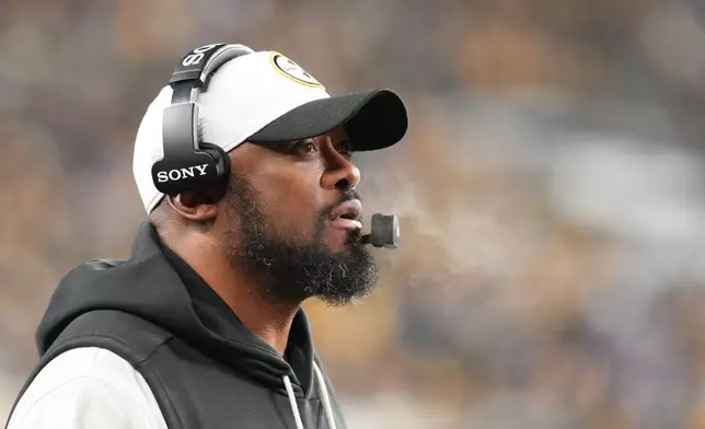 Pittsburgh Steelers head coach Mike Tomlin watches from the sideline during the first half of an NFL football game against the Baltimore Ravens, Sunday, Jan. 4, 2026, in Pittsburgh. (AP Photo/Gene J. Puskar)