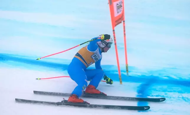 Italy's Nicol Delago speeds down the course during an alpine ski, women's World Cup downhill, in Tarvisio, Italy, Saturday, Jan. 17, 2026. (AP Photo/Giovanni Auletta)