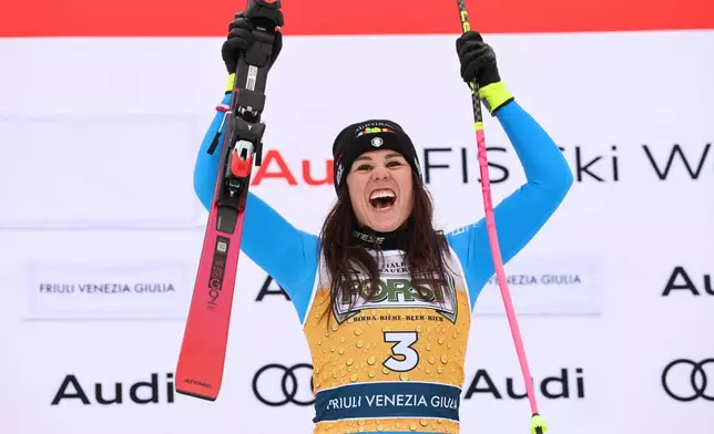 Italy's Nicol Delago celebrates after winning an alpine ski, women's World Cup downhill, in Tarvisio, Italy, Saturday, Jan. 17, 2026. (AP Photo/Marco Trovati)