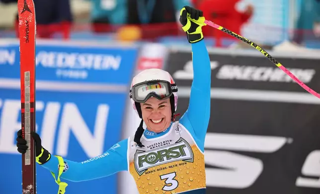 Italy's Nicol Delago celebrates at the finish area of an alpine ski, women's World Cup downhill, in Tarvisio, Italy, Saturday, Jan. 17, 2026. (AP Photo/Marco Trovati)