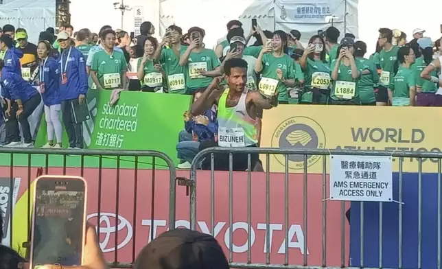 The champion for the men's full marathon: Bizuneh Melaku Belachew from Ethiopia, Photo by Bastille Post