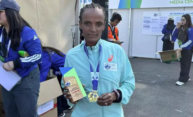 The champion for the women's full marathon: Habtegebrel Eshete H. Habte, Photo by Bastille Post