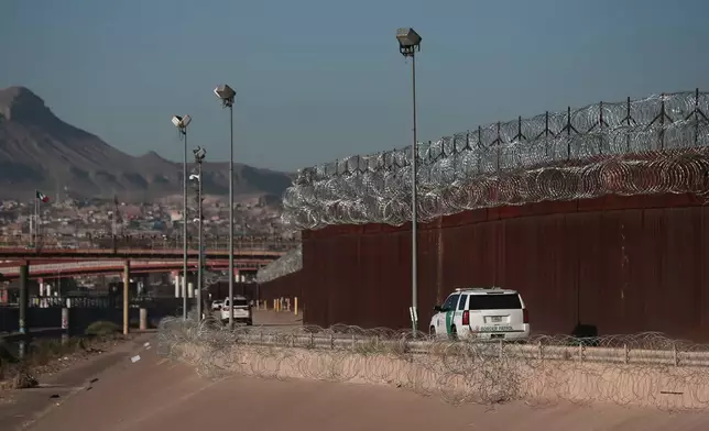 A U.S. Border Patrol patrol along the U.S.-Mexico border in El Paso, Texas, near the Paso del Norte International Bridge, seen from Ciudad Juarez, Mexico, Wednesday, Feb. 11, 2026. (AP Photo/Christian Chavez)