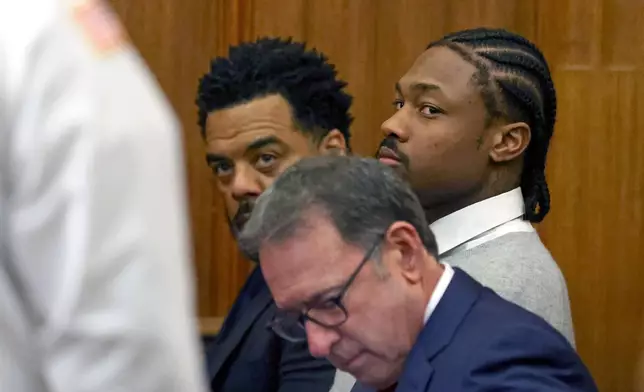 New England Patriots' Stefon Diggs, right, appears for his arraignment on felony strangulation and a misdemeanor assault charges, Friday, Feb. 13, 2026, at District Court in Dedham, Mass. (David L. Ryan/The Boston Globe via AP, Pool)