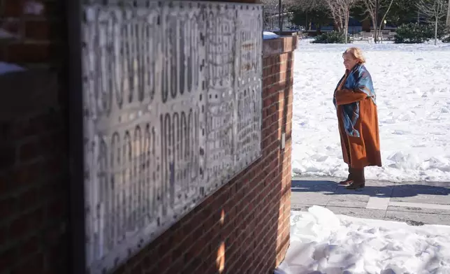U.S. District Judge Cynthia Rufe inspects the location of the now removed explanatory panels that were part of an exhibit on slavery at President's House Site in Philadelphia, Monday, Feb. 2, 2026. (AP Photo/Matt Rourke)