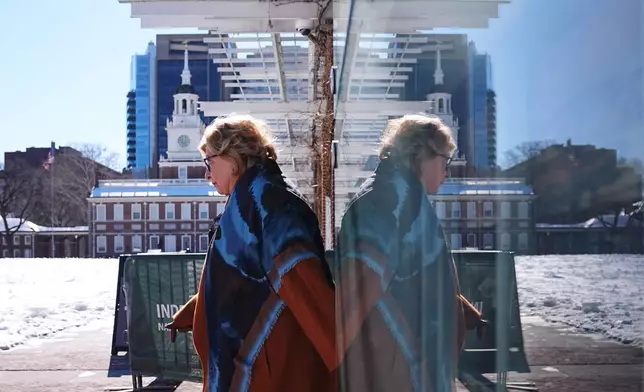 U.S. District Judge Cynthia Rufe, in view of Independence Hall, departs after inspecting the location of the now removed explanatory panels that were part of an exhibit on slavery at President's House Site in Philadelphia, Monday, Feb. 2, 2026. (AP Photo/Matt Rourke)