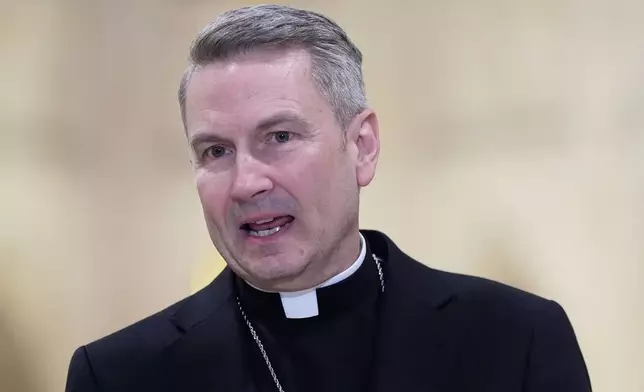 Archbishop-designate Ronald Hicks talks to reporters during a news conference at St. Patrick's Cathedral in New York, Thursday, Feb. 5, 2026. (AP Photo/Seth Wenig)