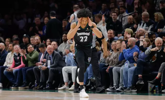 Minnesota Timberwolves guard Jaylen Clark (22) celebrates after making a 3-point basket during the first half of an NBA basketball game against the Atlanta Hawks, Monday, Feb. 9, 2026, in Minneapolis. (AP Photo/Bailey Hillesheim)