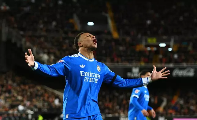Real Madrid's Kylian Mbappe reacts during the Spanish La Liga soccer match between Valencia and Real Madrid in Valencia, Spain, Sunday, Feb. 8, 2026. (AP Photo/Francisco Macia)