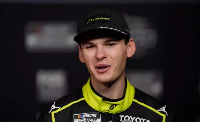Corey Heim speaks during a NASCAR Daytona 500 media day, Wednesday, Feb. 11, 2026, in Daytona, Fla. (AP Photo/Mike Stewart)