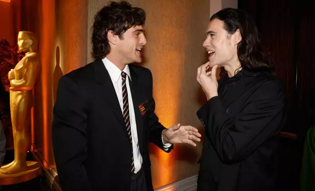 Jacob Elordi, left, and Oliver Laxe attend the 98th Academy Awards Oscar nominees luncheon on Tuesday, Feb. 10, 2026, at the Beverly Hilton Hotel in Beverly Hills, Calif. (Photo by Caroline Brehman/Invision/AP)