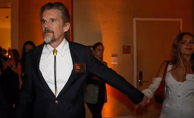 Ethan Hawke, left, and Indiana Hawke attend the 98th Academy Awards Oscar nominees luncheon on Tuesday, Feb. 10, 2026, at the Beverly Hilton Hotel in Beverly Hills, Calif. (Photo by Caroline Brehman/Invision/AP)