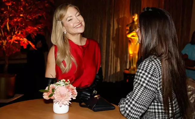 Kate Hudson, left, attends the 98th Academy Awards Oscar nominees luncheon on Tuesday, Feb. 10, 2026, at the Beverly Hilton Hotel in Beverly Hills, Calif. (Photo by Caroline Brehman/Invision/AP)