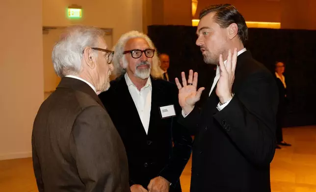 Steven Spielberg, from left, George DiCaprio, and Leonardo DiCaprio attend the 98th Academy Awards Oscar nominees luncheon on Tuesday, Feb. 10, 2026, at the Beverly Hilton Hotel in Beverly Hills, Calif. (Photo by Caroline Brehman/Invision/AP)