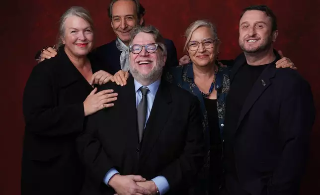 Kate Hawley, from left, Alexandre Desplat, Guillermo del Toro, Tamara Deverell, and Mike Hill pose for a portrait during the 98th Academy Awards Oscar nominees luncheon on Tuesday, Feb. 10, 2026, at the Beverly Hilton Hotel in Beverly Hills, Calif. (AP Photo/Chris Pizzello)