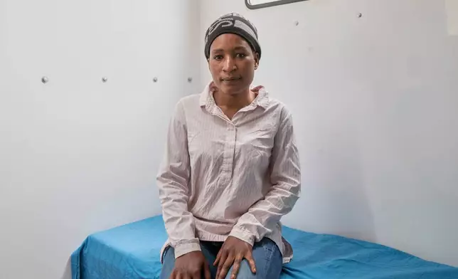 Constance Mukoloka sits inside a consulting room as she waiting to receive an injection of the new HIV prevention drug lenacapavir, in Harare, Zimbabwe, Thursday, Feb. 19, 2026. (AP Photo/Aaron Ufumeli)
