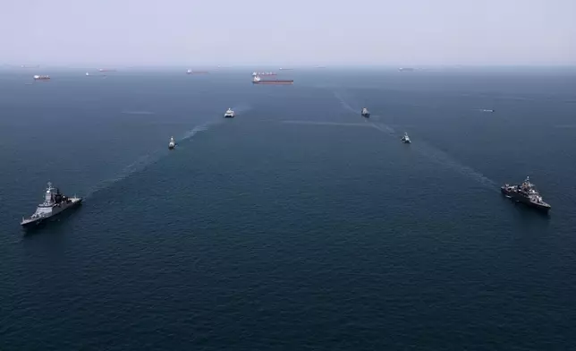 This image provided Thursday Feb. 19, 2026 by the Iranian military and dated Tuesday, Feb. 17, 2025, shows navy ships conducting operations during a join drill by Iranian and Russian forces in the Indian Ocean. (Masoud Nazari Mehrabi/Iranian Army via AP)