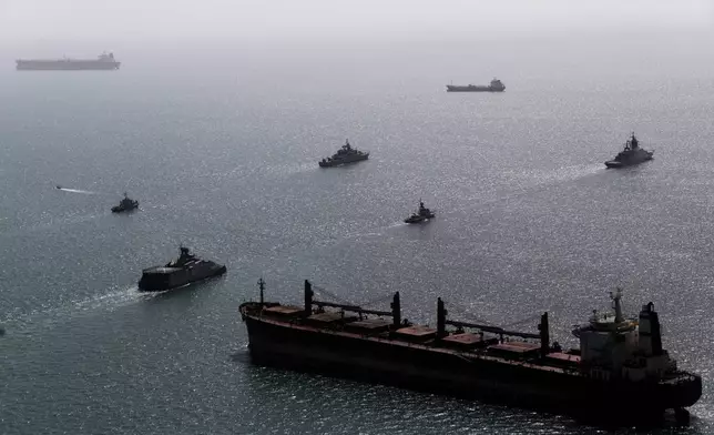 This image provided Thursday Feb. 19, 2026 by the Iranian military and dated Tuesday, Feb. 17, 2025, shows navy ships conducting operations during a join drill by Iranian and Russian forces in the Indian Ocean.(Masoud Nazari Mehrabi/Iranian Army via AP)