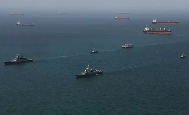 This image provided Thursday Feb. 19, 2026 by the Iranian military and dand dated Wednesday, Feb. 18, 2025, shows navy ships conducting operations during a join drill by Iranian and Russian forces in the Indian Ocean.(Masoud Nazari Mehrabi/Iranian Army via AP)