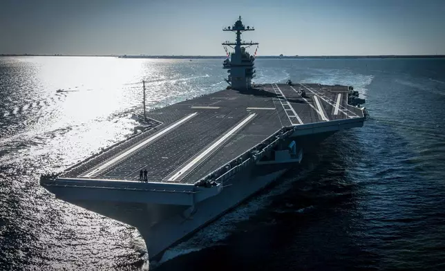 FILE - In this photo provided by the U.S. Navy, the USS Gerald R. Ford embarked on the first of its sea trials to test various state-of-the-art systems on its own power for the first time, April 8, 2017, from Newport News, Va. (Mass Communication Specialist 2nd Class Ridge Leoni/U.S. Navy via AP, File)