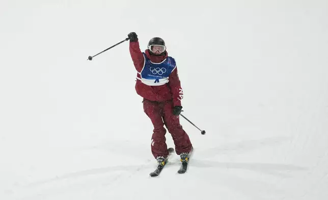 Canada's Megan Oldham reacts during the women's freestyle skiing big air finals at the 2026 Winter Olympics, in Livigno, Italy, Monday, Feb. 16, 2026. (AP Photo/Lindsey Wasson)