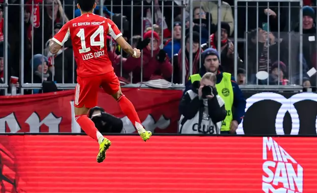 Bayern Munich's Luis Diaz celebrates scoring during the Bundesliga soccer match between Bayern Munich and TSG 1899 Hoffenheim in Munich, Germany, Sunday Feb. 8, 2026. (Sven Hoppe/dpa via AP)