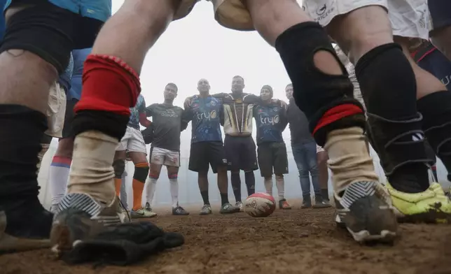 Inmates play rugby at the Valparaiso Prison Complex in Valparaiso, Chile, as part of a social reintegration program, Thursday, Jan. 29, 2026. (AP Photo/Cristobal Escobar)