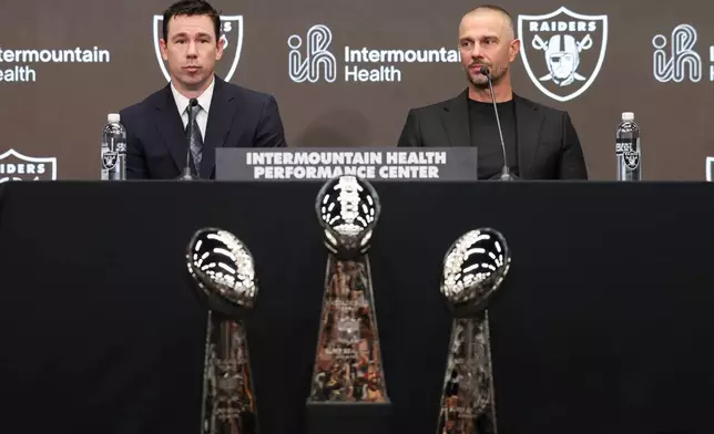 Las Vegas Raiders head coach Klint Kubiak and general manger John Spytek attend an introductory news conference at the NFL football team's training facility in Henderson, Nev., Tuesday, Feb. 10, 2026. (AP Photo/Ian Maule)