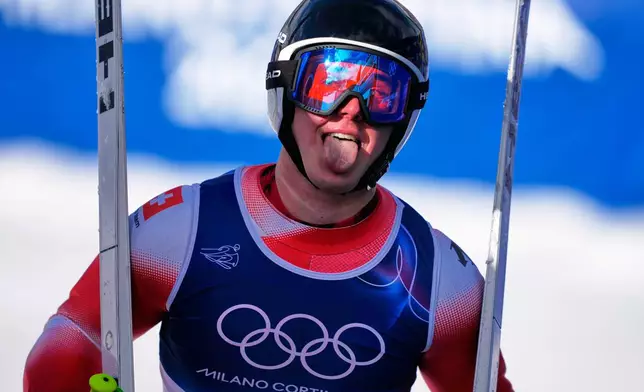 Switzerland's Franjo von Allmen at the finish area, during a men's super-G race, at the 2026 Winter Olympics, in Bormio, Italy, Wednesday, Feb.11, 2026. (AP Photo/Julia Demaree Nikhinson)