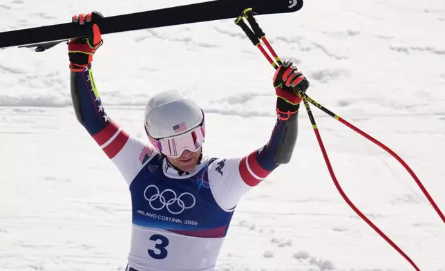 United States' Ryan Cochran Siegle celebrates at the finish area of an alpine ski, men's super-G race, at the 2026 Winter Olympics, in Bormio, Italy, Wednesday, Feb. 11, 2026. (AP Photo/Rebecca Blackwell)