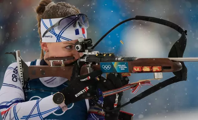 Oceane Michelon, of France, competes in the women's 12.5-kilometer mass start biathlon race at the 2026 Winter Olympics in Anterselva, Italy, Saturday, Feb. 21, 2026. (AP Photo/Andrew Medichini)
