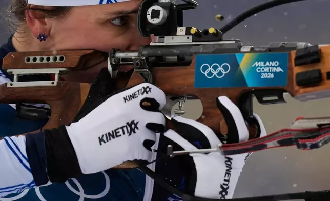 Julia Simon, of France, competes in the women's 12.5-kilometer mass start biathlon race at the 2026 Winter Olympics in Anterselva, Italy, Saturday, Feb. 21, 2026. (AP Photo/Andrew Medichini)