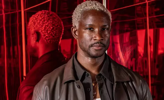FILE - Akinola Davies Jr., director of the film "My Father's Shadow," poses at the 78th international film festival in Cannes, southern France, on May 19, 2025. (Photo by Joel C Ryan/Invision/AP, File)